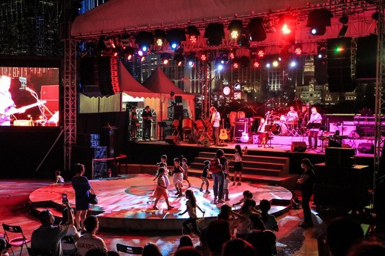 Outdoor Concert Stage with Children Dancing