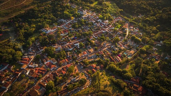 Hillside Colonial Town at Golden Hour from the Air