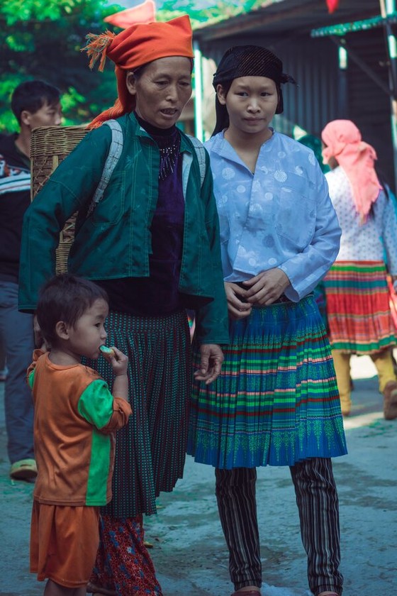 Hill-Tribe Women and Child at a Market